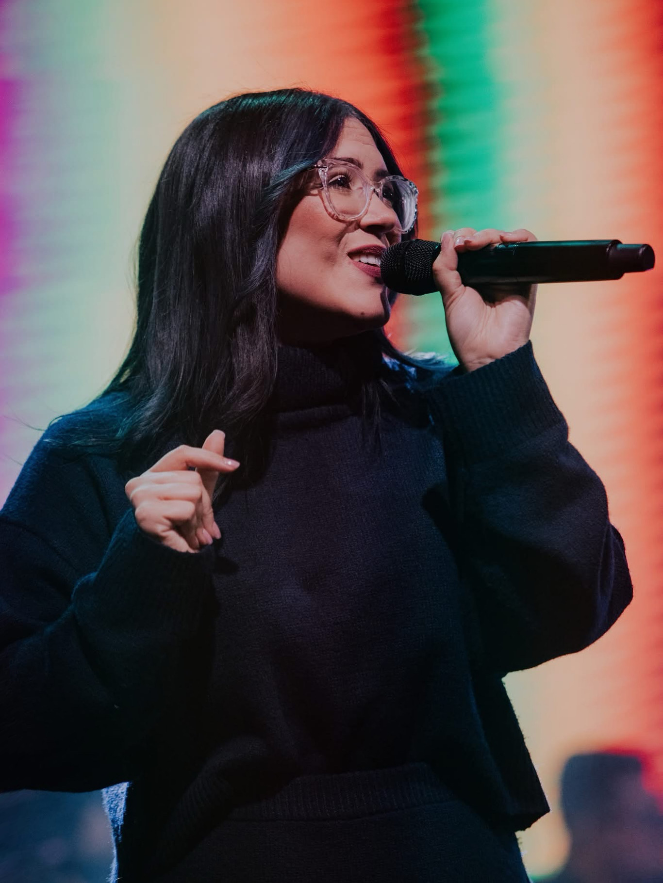 Mely at a leadership speaking engagement